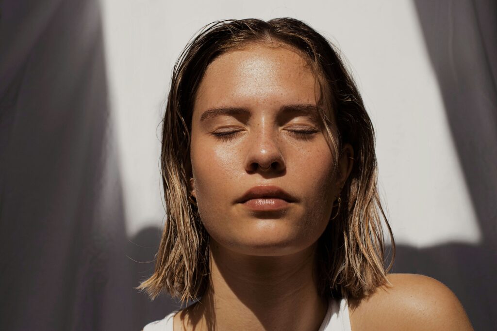 Girl who uses anti-aging skincare products