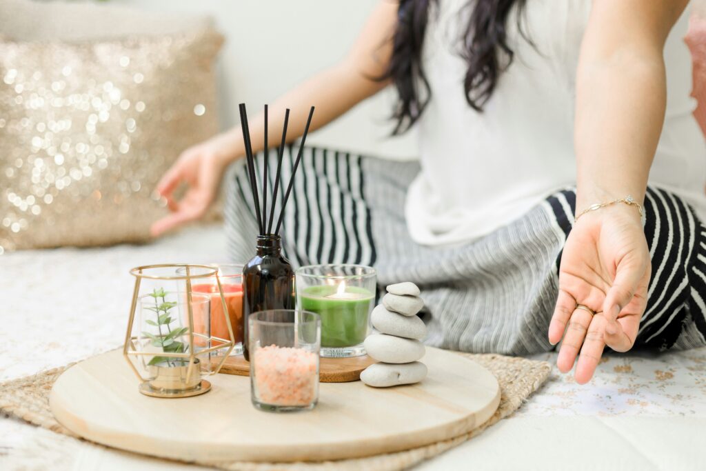 a person meditating with self-care finds